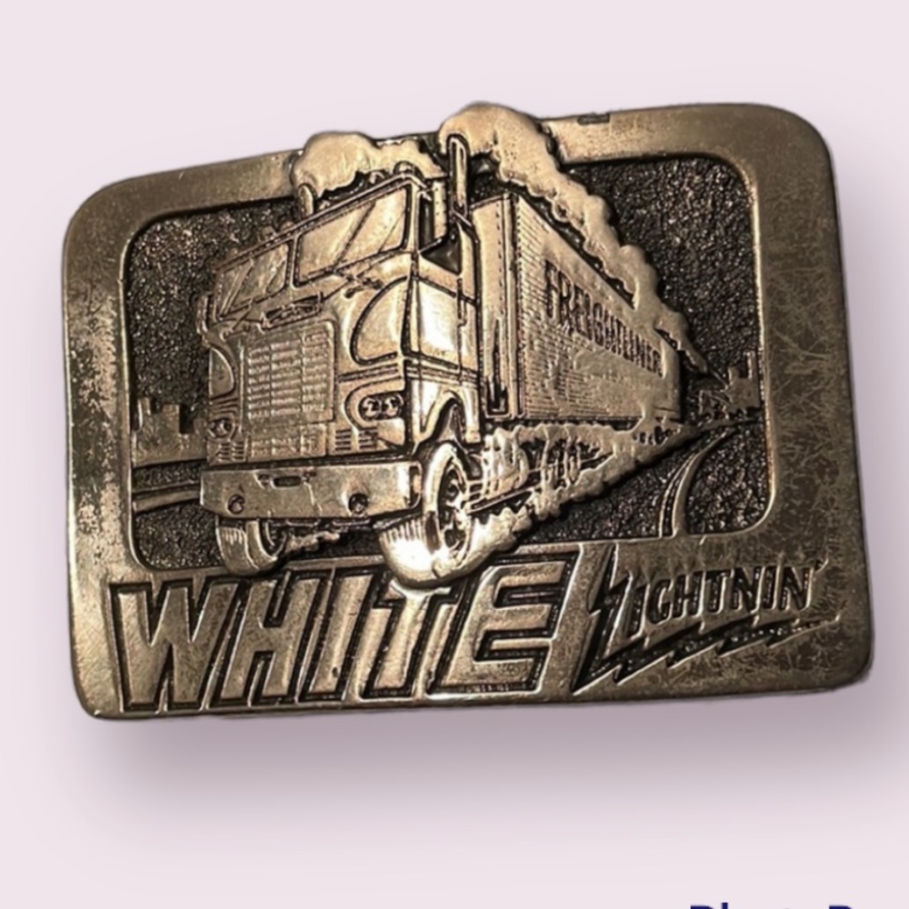 Rare Vintage “White Lightnin” freightliner belt buckle